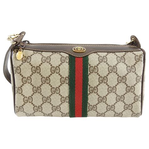 vintage gucci cylinder bag|vintage canvas shoulder bag Gucci.